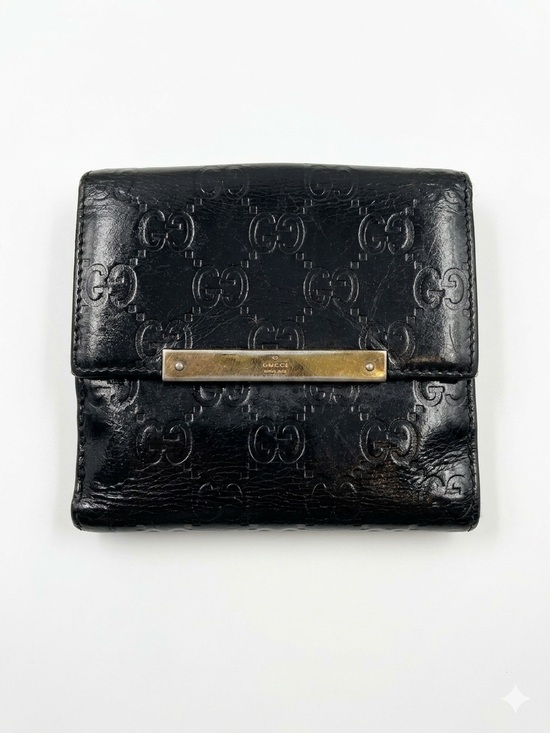 Gucci Handbags - Gucci Black Embossed Leather Bifold Wallet with Subtle Logo